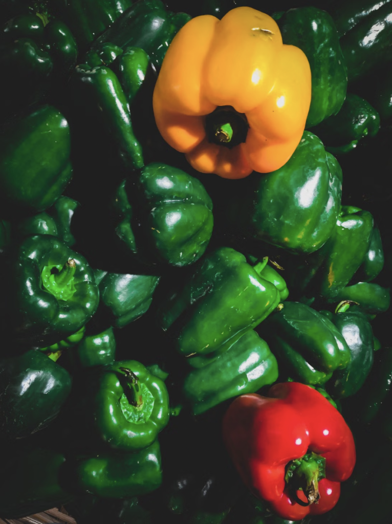 Colorful mix of bell peppers in varying shades. Perfect for healthy and organic food concepts.